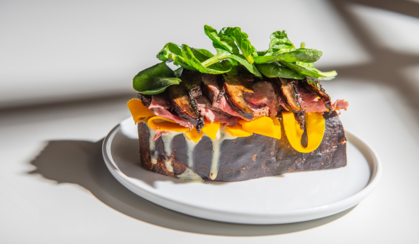 grilled focaccia with roast beef, macerated portobello, pickled pumpkin and homemade mustard